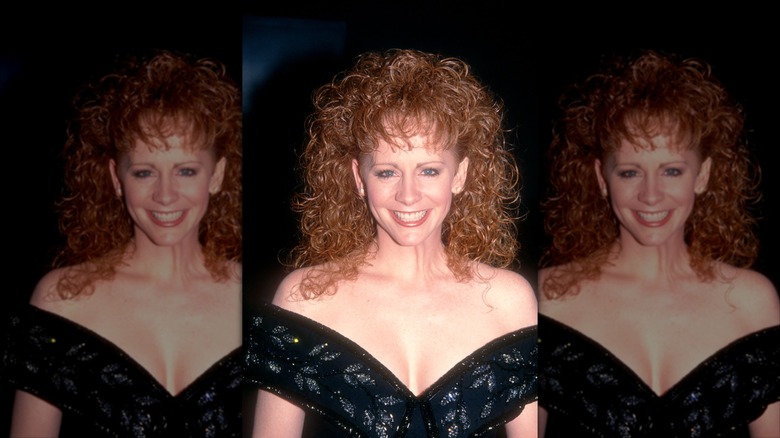 Reba McEntire smiling with teeth