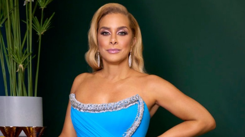 Robyn Dixon staring blonde hair hand hip