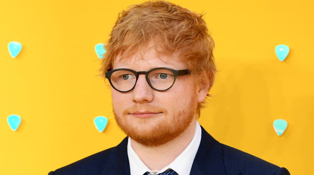 Ed Sheeran poses for cameras 