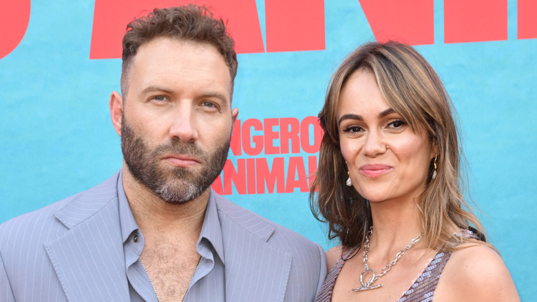 Jai Courtney and Dina Shihabi at the Los Angeles premiere of "Dangerous Animals"
