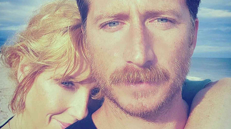 Kelly Reilly and Kyle Baugher posing at the beach