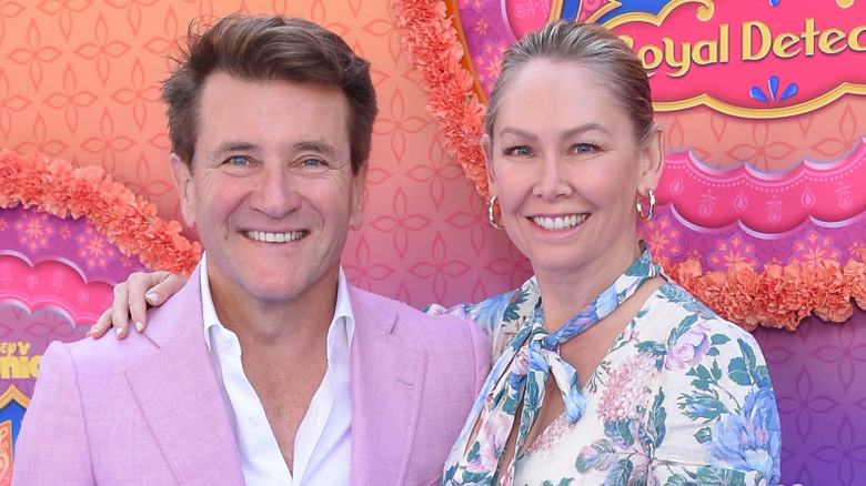 Kym Johnson and Robert Herjavec at an event