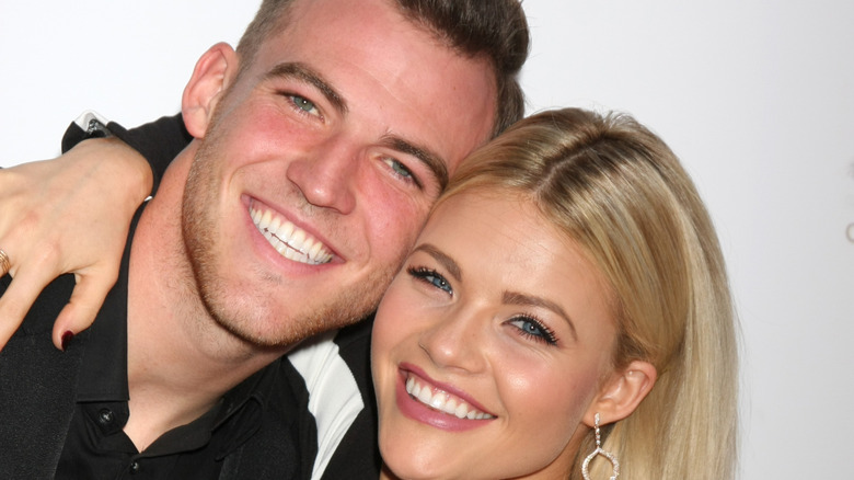 Witney Carson and Carson McAllister smiling for a photo