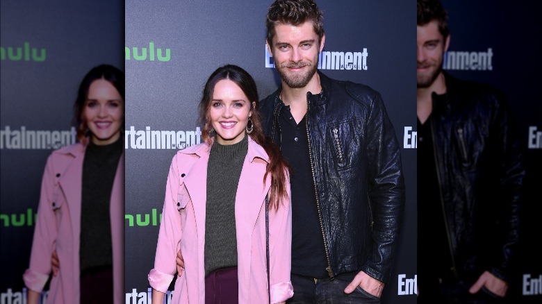Rebecca Breeds and Luke Mitchell smiling