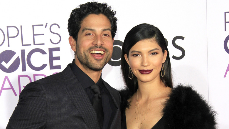 Adam Rodriguez and Grace Gail posing together