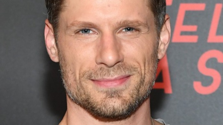 Matt Lauria half smiling