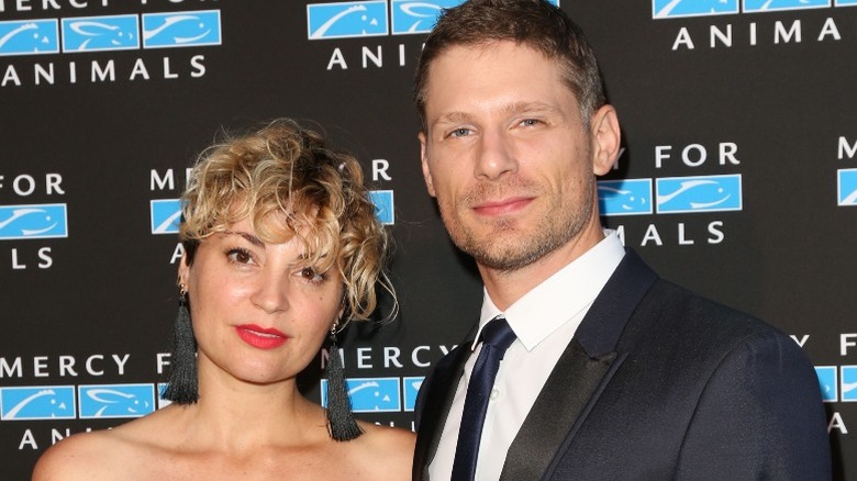 Michelle Armstrong and Matt Lauria posing