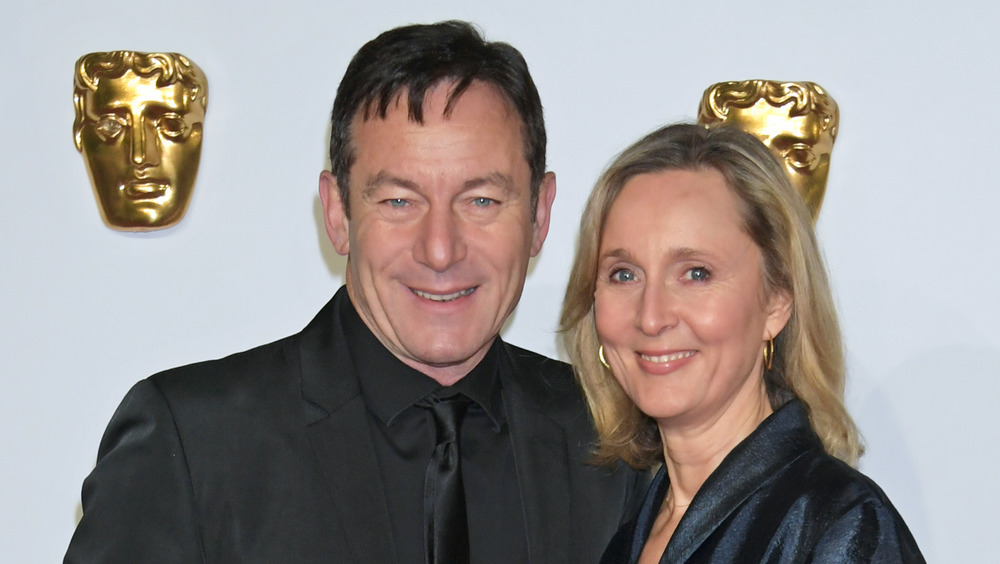 Jason Isaacs and Mary Hewitt smiling