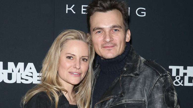 Amiee Mullins and Rupert Friend posing