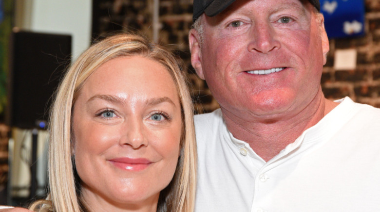 Elisabeth Röhm and Jonathan Colby smiling 