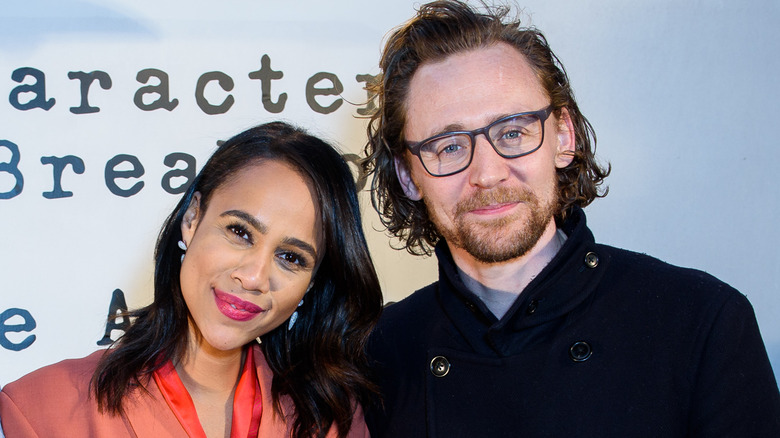 Zawe Ashton and Tom Hiddleston smiling 