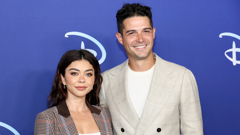 Sarah Hyland and Wells Adams posing together
