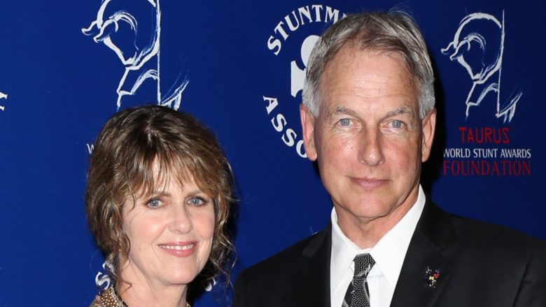 Pam Dawber and Mark Harmon smiling 
