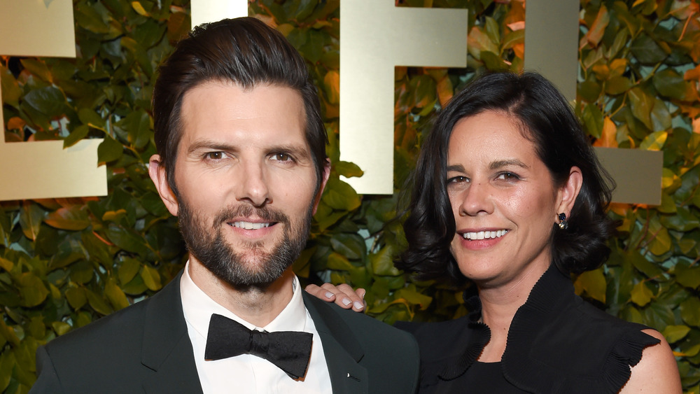 Adam Scott and Naomi Scott smiling 