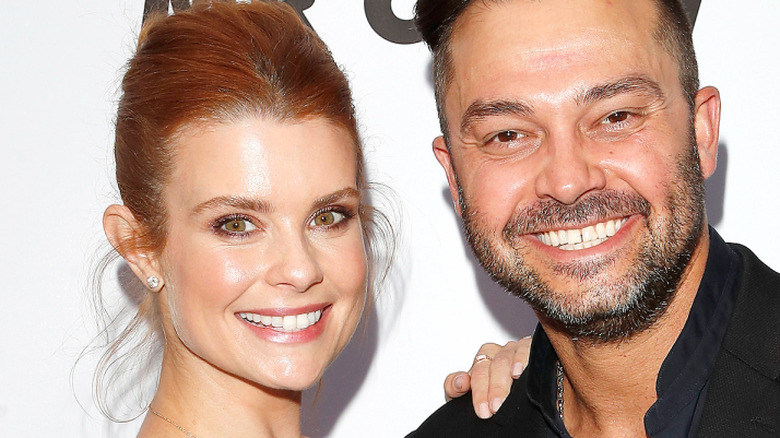 JoAnna Garcia Swisher and Nick Swisher at an event
