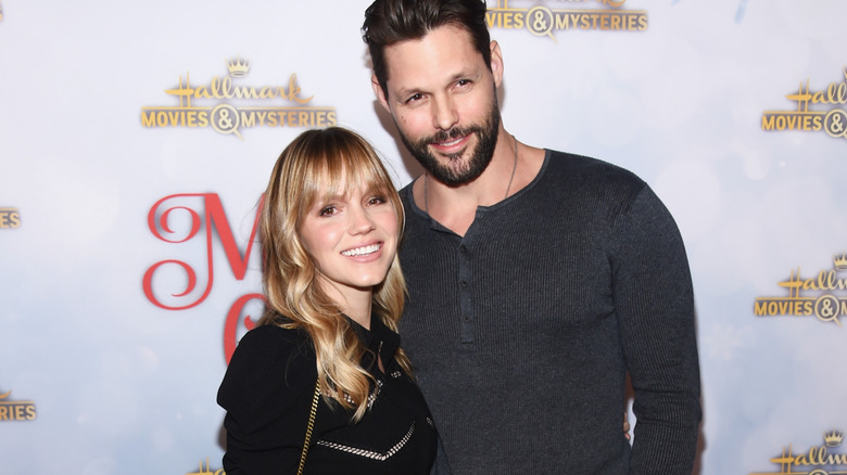 Alexa Havins and Justin Bruening at an event