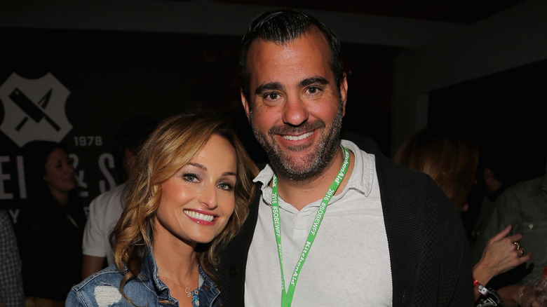 Giada De Laurentiis and Shane Farley smile for cameras