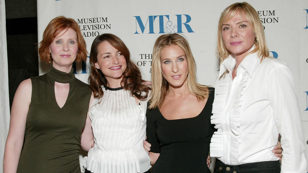 The cast of Sex and the City posing on the red carpet 