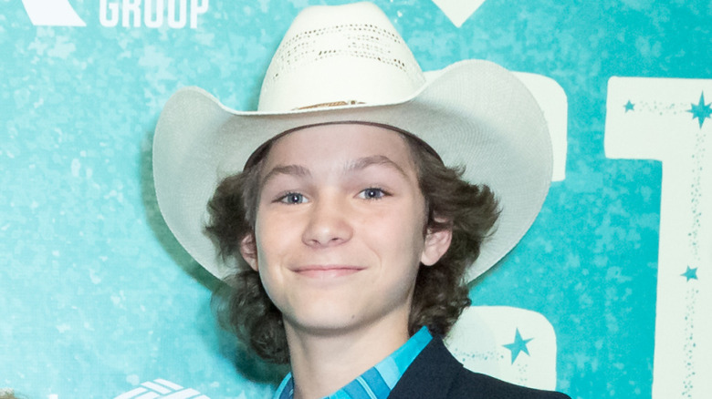 Montana Jordan wearing a cowboy hat