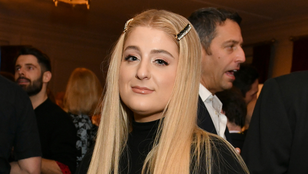 Meghan Trainor smirking