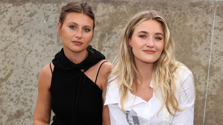Aly and AJ in 2007, smiling at a carpet event