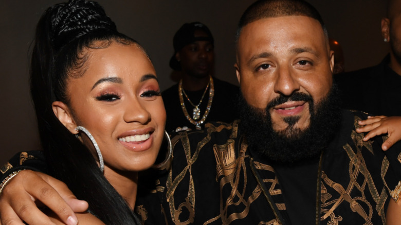 Cardi B and DJ Khaled smiling