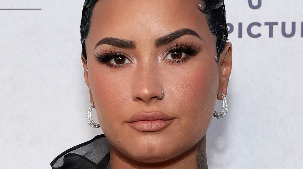 Demi Lovato staring at camera