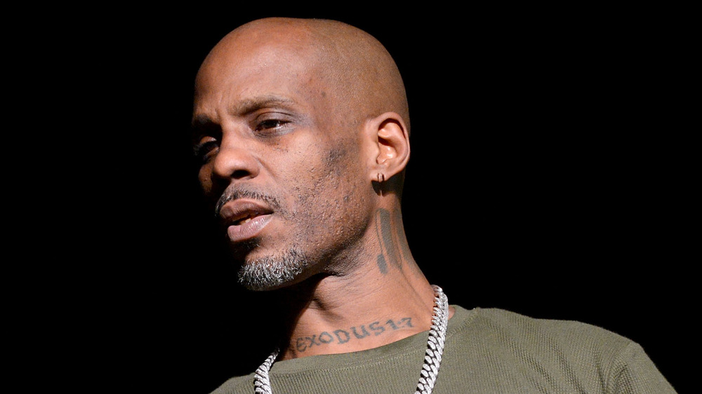 Rapper DMX performing in green