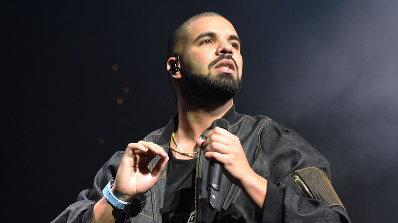 Drake with a serious expression
