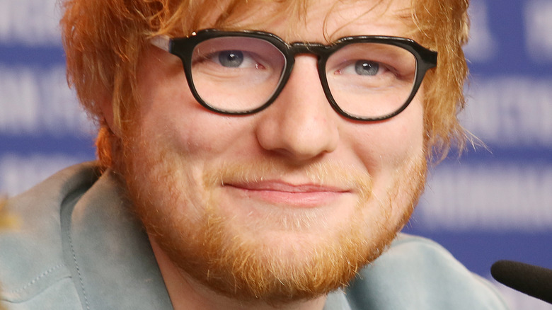 Ed Sheeran smiling at an event