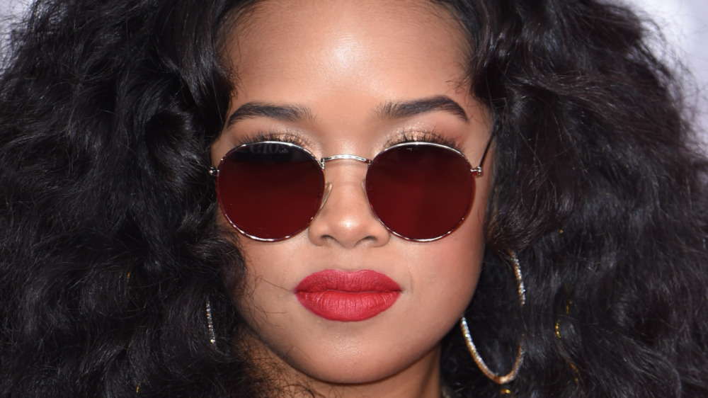 H.E.R. wearing sunglasses