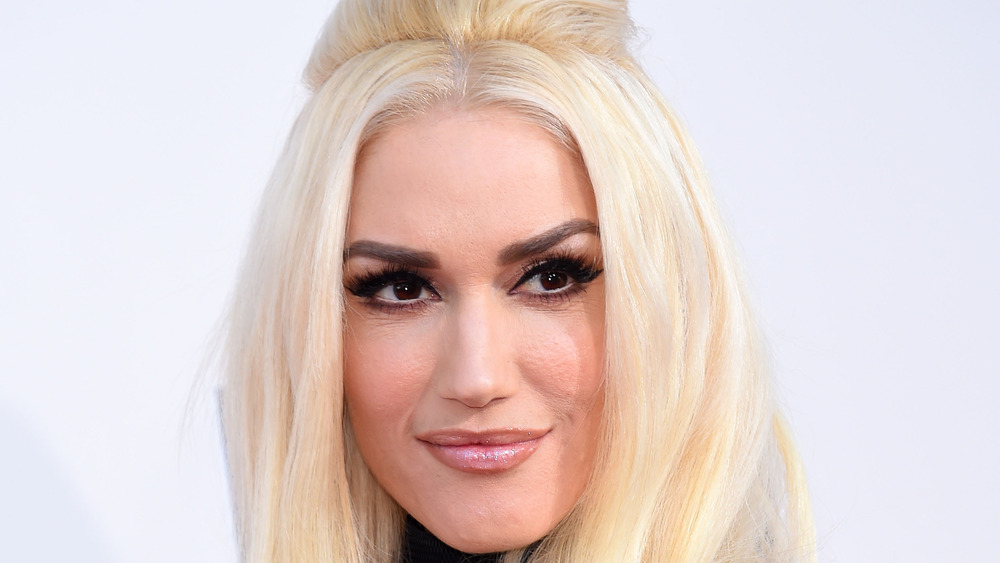 Gwen Stefani smiling looking to the right