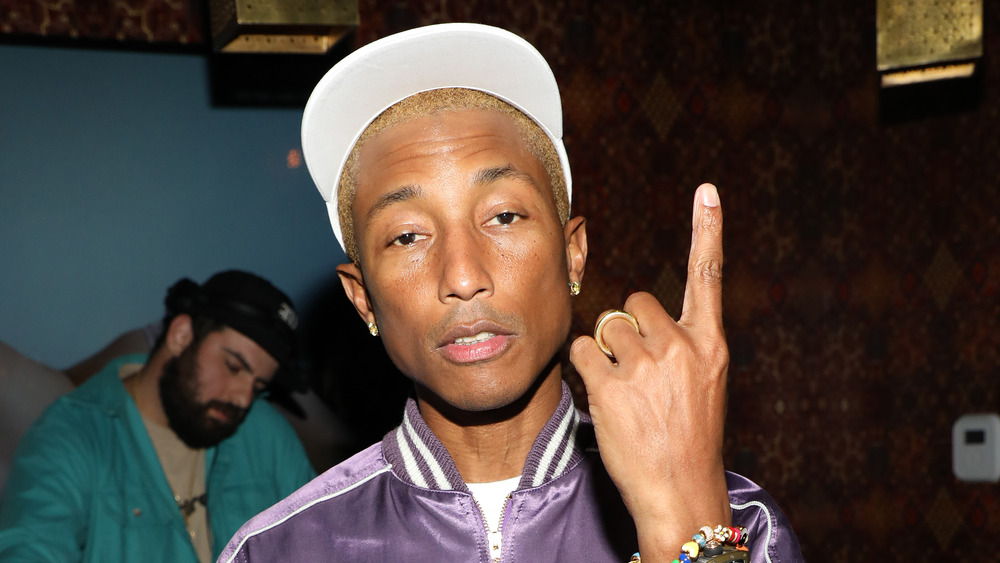 Pharrell Williams posing