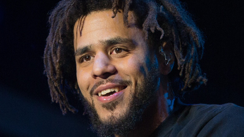 J. Cole smiling