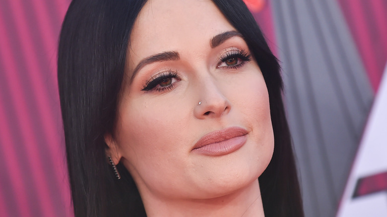 Kacey Musgraves with serious expression close up