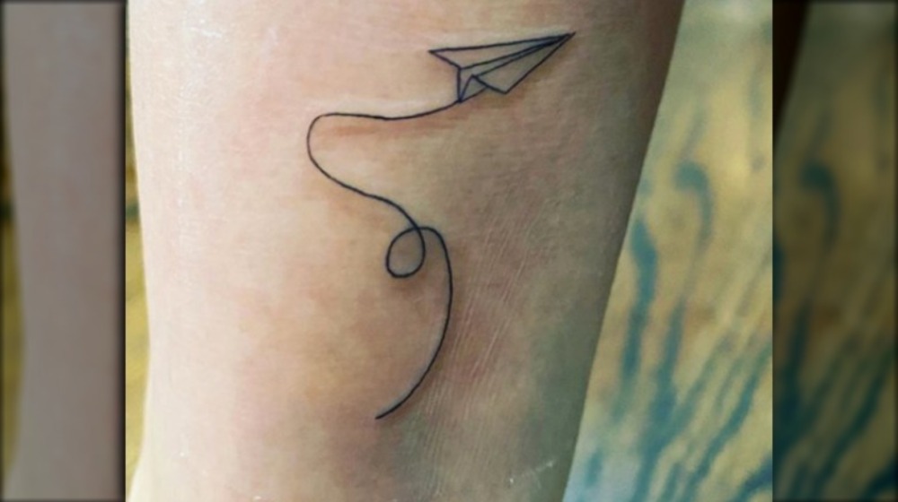 Kaley Cuoco airplane tattoo