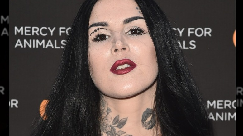 Kat Von D showing off Rafael Reyes kiss neck tattoo