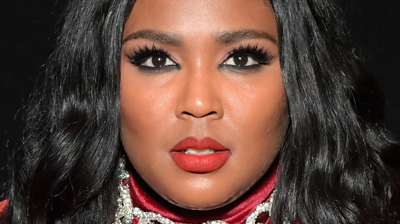 Lizzo with a serious expression