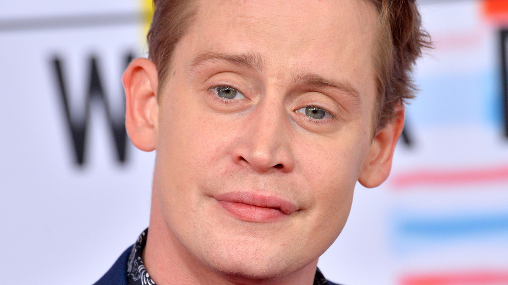 Macaulay Culkin smiling