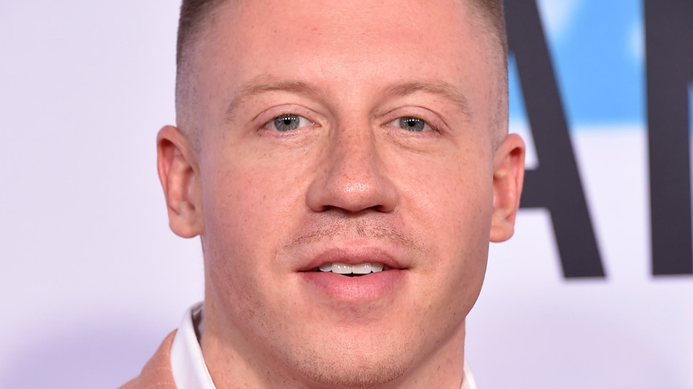 Macklemore smiles on the AMAs red carpet