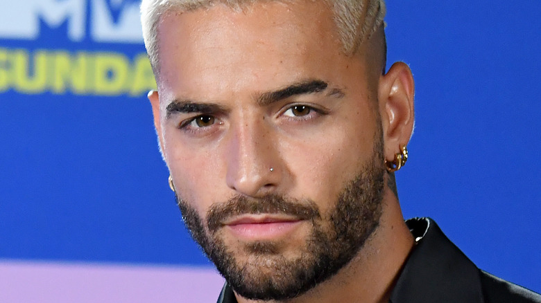 Maluma with a serious expression