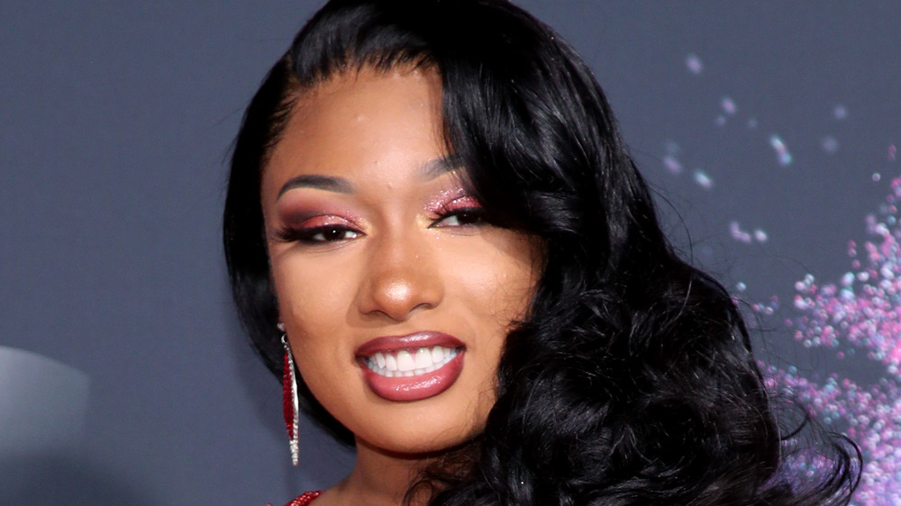 Megan Thee Stallion grinning