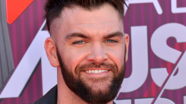 Dylan Scott ACMs red carpet smiling