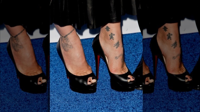 Pink wearing black heels