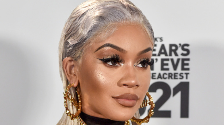 In this image released on December 31, Saweetie arrives at Dick Clark's New Year's Rockin' Eve with Ryan Seacrest 2021