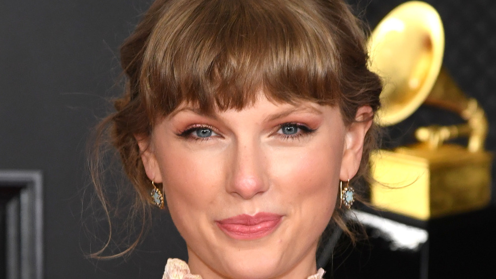 Taylor Swift smirking