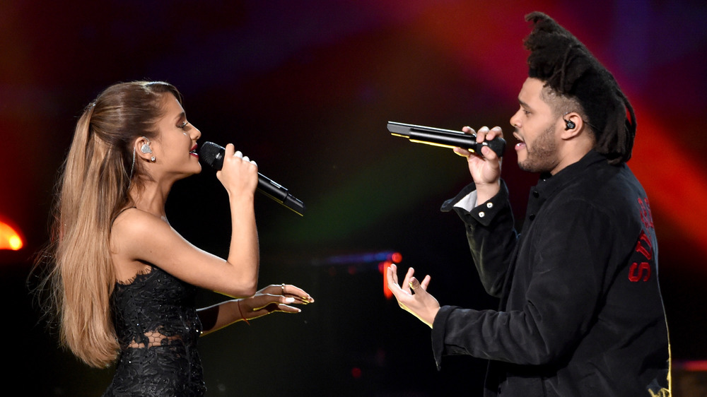 Ariana Grande and The Weeknd singing