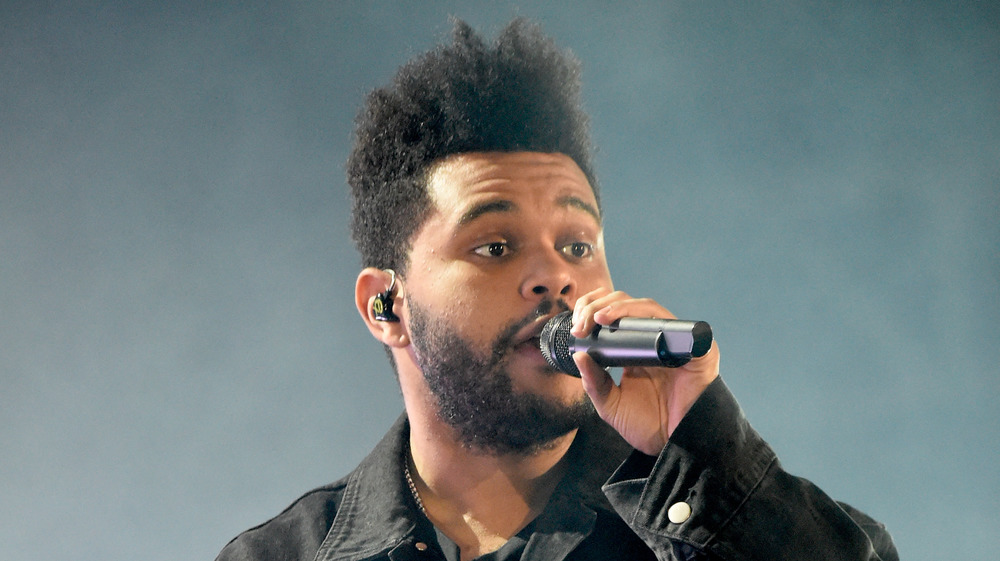 The Weeknd performs on stage 