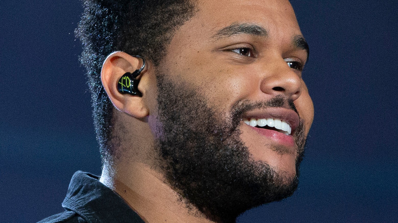 The Weeknd purses his lips on the red carpet
