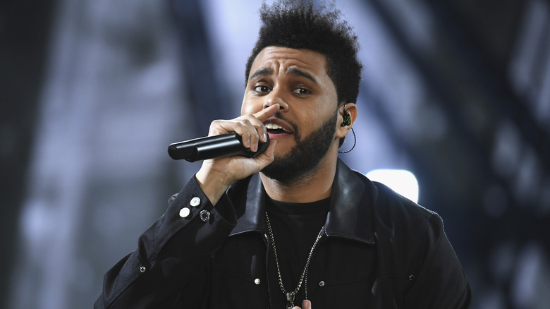 The Weeknd performing on stage